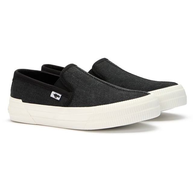 Zapatillas Rocket Dog negras para mujer, con un alegre diseño de huerto, confeccionadas en algodón y suela de goma. Incluyen plantilla acolchada, logo Rocket Dog y suela de goma.