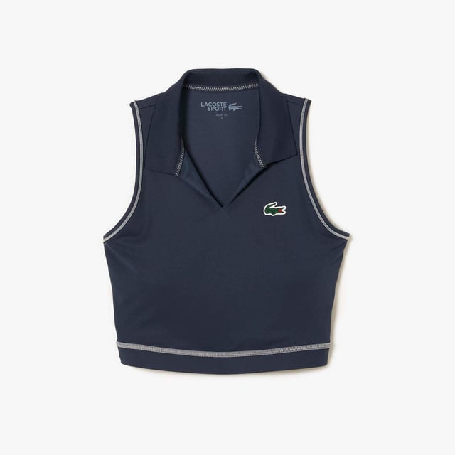 Women's Lacoste Sport Polo Style Sports Bra.- Tight, close-fitting cut: Perfect for any sport.- Ribbed collar: A classic Lacoste finish detail.- Interlock fabric: Hard-wearing and absorbent.- Silicone crocodile badge: Iconic. Material: 85% Polyester, 15% Elastane. Ref: IF4913KXE.