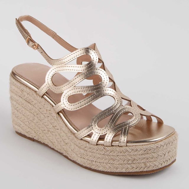 Espadrille wedge sandals for women. 100% natural leather insole. Comfortable fit. Manufactured by other brands for our brand. Approximate measurements: 8 cm wedge and 3 cm platform