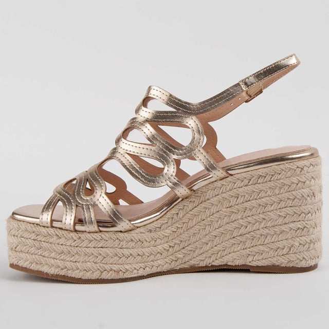 Espadrille wedge sandals for women. 100% natural leather insole. Comfortable fit. Manufactured by other brands for our brand. Approximate measurements: 8 cm wedge and 3 cm platform