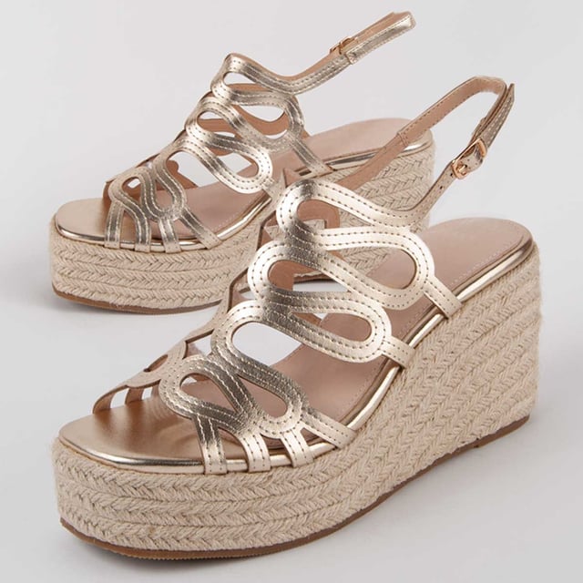 Espadrille wedge sandals for women. 100% natural leather insole. Comfortable fit. Manufactured by other brands for our brand. Approximate measurements: 8 cm wedge and 3 cm platform