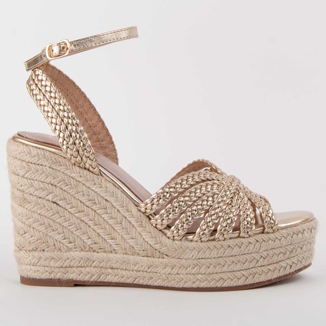 Espadrille wedge sandals for women. 100% natural leather insole. Comfortable fit. Manufactured by other brands for our brand. Approximate measurements: 8 cm wedge and 3 cm platform