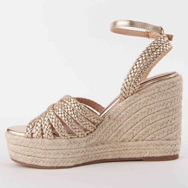 Espadrille wedge sandals for women. 100% natural leather insole. Comfortable fit. Manufactured by other brands for our brand. Approximate measurements: 8 cm wedge and 3 cm platform