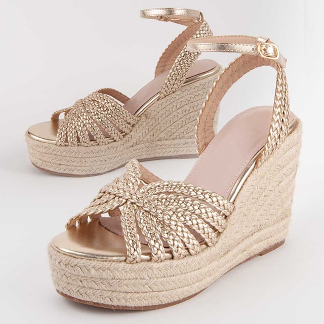 Espadrille wedge sandals for women. 100% natural leather insole. Comfortable fit. Manufactured by other brands for our brand. Approximate measurements: 8 cm wedge and 3 cm platform