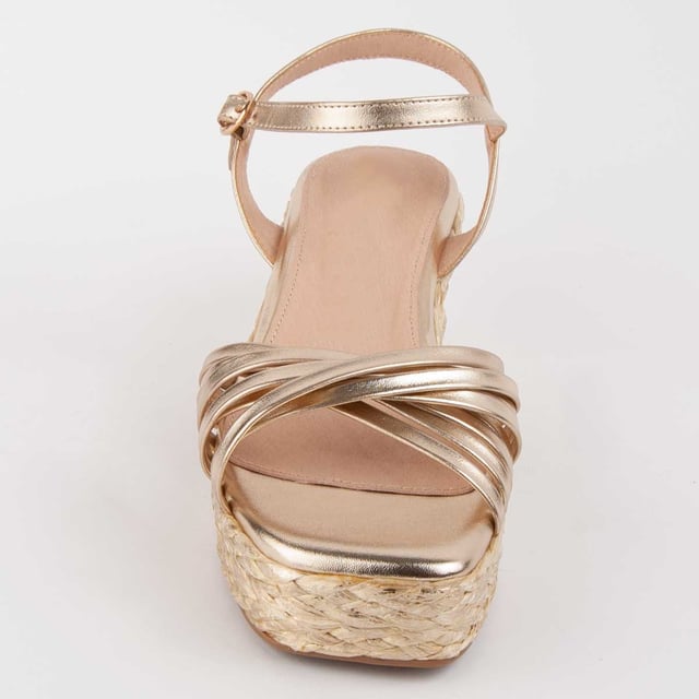 Sandalia de cuña de esparto para mujer. Plantilla de piel 100% natural. Calce cómodo. Fabricado por otras marcas para nuestra marca. Medidas aproximadas: 7 cm de cuña y 3 cm de plataforma.