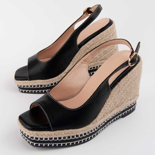 Espadrille Wedges für Damen. Einlegesohle aus 100% natürlichem Leder. Bequemer Sitz. Hergestellt von anderen Marken für unsere Marke. Ungefähre Maße: 9 cm Keil und 3 cm Plattform.