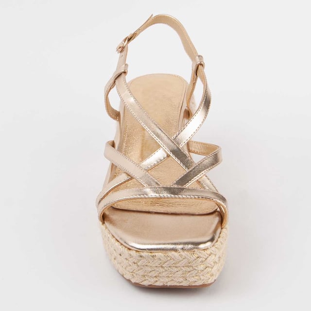 Sandalia de cuña de esparto para mujer. Plantilla de piel 100% natural. Calce cómodo. Fabricado por otras marcas para nuestra marca. Medidas aproximadas: 7 cm de cuña y 3 cm de plataforma.