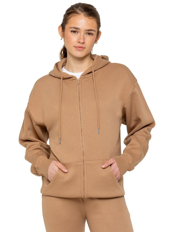 The Enzo Women's Zipped Hoodie boasts an oversized fit with a convenient zip-up design and adjustable drawstring hoodie. The cuffed wrists and brushed back inner fleece ensure maximum comfort, making it the perfect choice for casual wea
