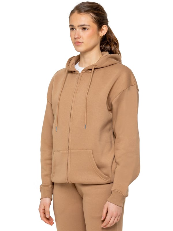 The Enzo Women's Zipped Hoodie boasts an oversized fit with a convenient zip-up design and adjustable drawstring hoodie. The cuffed wrists and brushed back inner fleece ensure maximum comfort, making it the perfect choice for casual wea
