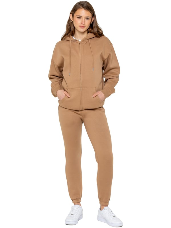 The Enzo Women's Zipped Hoodie boasts an oversized fit with a convenient zip-up design and adjustable drawstring hoodie. The cuffed wrists and brushed back inner fleece ensure maximum comfort, making it the perfect choice for casual wea