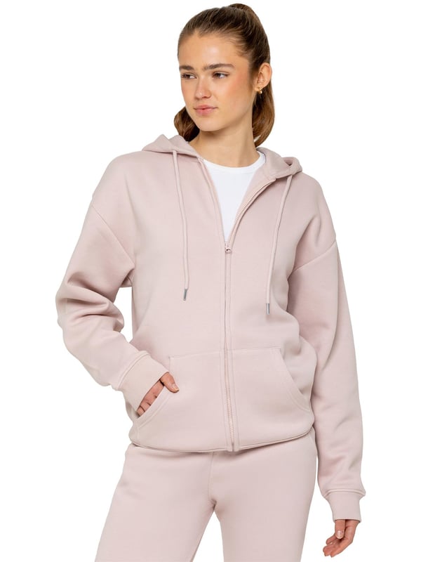 The Enzo Women's Zipped Hoodie boasts an oversized fit with a convenient zip-up design and adjustable drawstring hoodie. The cuffed wrists and brushed back inner fleece ensure maximum comfort, making it the perfect choice for casual wea