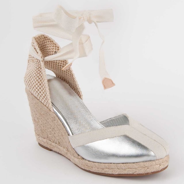 Wedge espadrille for women. 100% natural leather insole. Comfortable fit. Manufactured by other brands for our brand. Approximate measurements: 7 cm wedge and 2 cm platform.