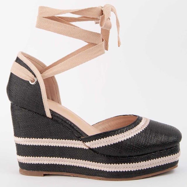 Wedge espadrille for women. 100% natural leather insole. Comfortable fit. Manufactured by other brands for our brand. Approximate measurements: 10 cm wedge and 3 cm platform.