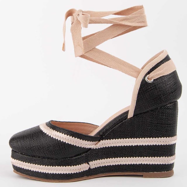 Wedge espadrille for women. 100% natural leather insole. Comfortable fit. Manufactured by other brands for our brand. Approximate measurements: 10 cm wedge and 3 cm platform.