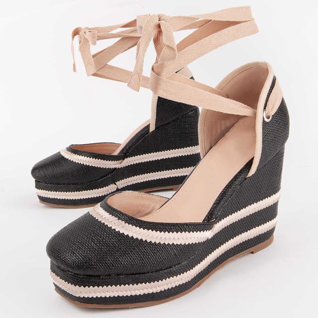 Wedge espadrille for women. 100% natural leather insole. Comfortable fit. Manufactured by other brands for our brand. Approximate measurements: 10 cm wedge and 3 cm platform.