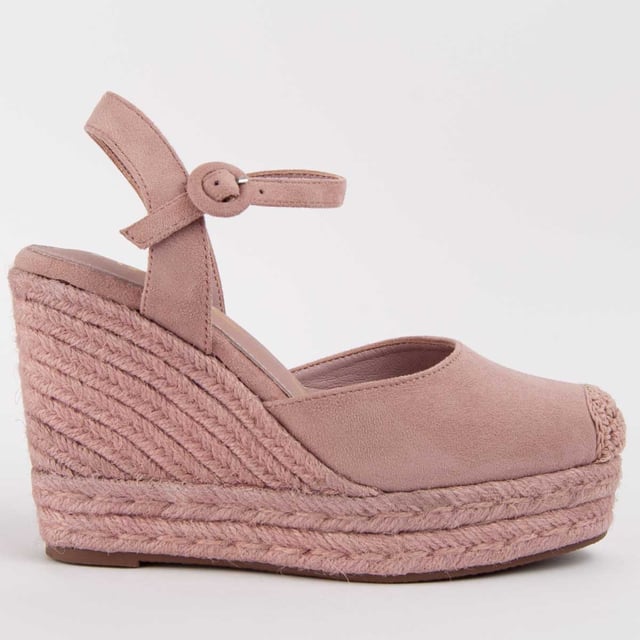 Wedge espadrille for women. 100% natural leather insole. Comfortable fit. Manufactured by other brands for our brand. Approximate measurements: 10 cm wedge and 3 cm platform.