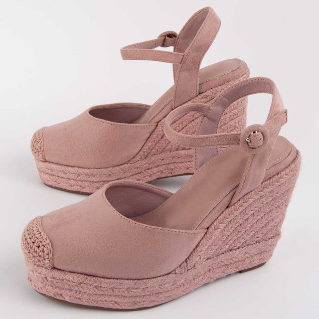 Wedge espadrille for women. 100% natural leather insole. Comfortable fit. Manufactured by other brands for our brand. Approximate measurements: 10 cm wedge and 3 cm platform.