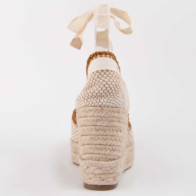 Wedge espadrille for women. 100% natural leather insole. Comfortable fit. Manufactured by other brands for our brand. Approximate measurements: 8 cm wedge and 2 cm platform