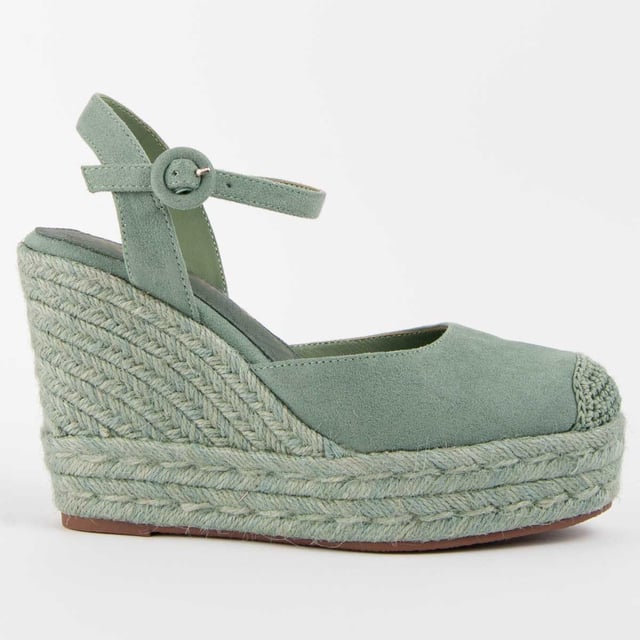 Wedge espadrille for women. 100% natural leather insole. Comfortable fit. Manufactured by other brands for our brand. Approximate measurements: 10 cm wedge and 3 cm platform.