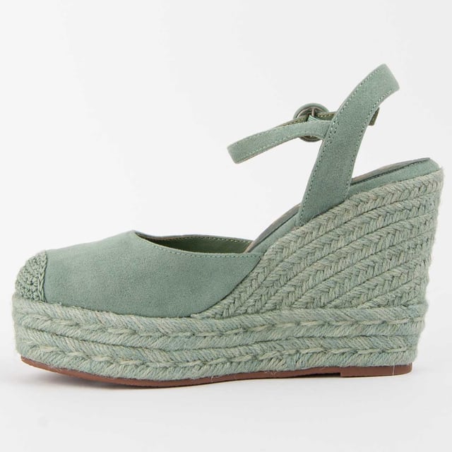 Wedge espadrille for women. 100% natural leather insole. Comfortable fit. Manufactured by other brands for our brand. Approximate measurements: 10 cm wedge and 3 cm platform.