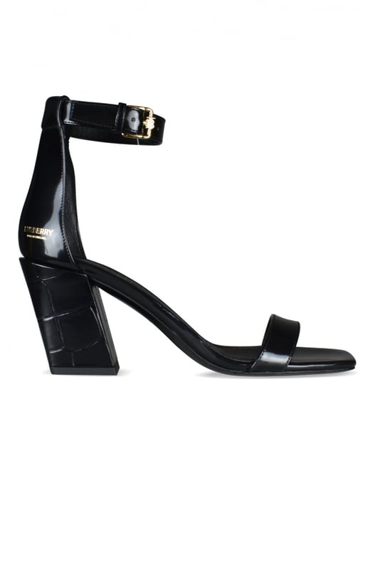 Burberry Sandalias Negro Sandalias de cuero negro de Burberry.Tacón de cocodrilo negro.Grabado en oro Burberry en el exterior del talón.Correa con puntera con logotipo dorado.100% cuero.Made in Italy.