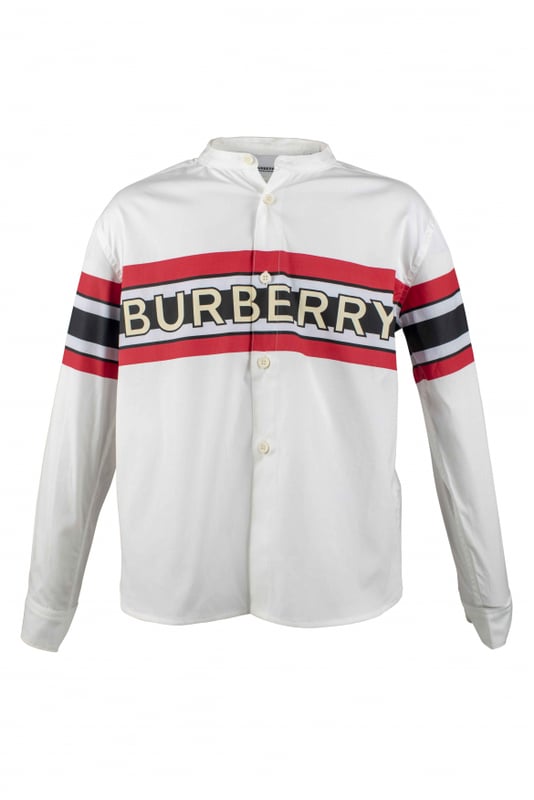 Wit katoenen overhemd Burberry kind.Logoprint met rode en blauwe strepen in het midden.Knoopsluiting.Lange mouwen.Made in Italy.