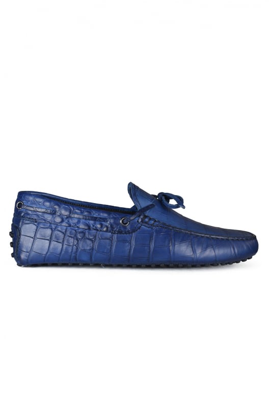 Mocasines Tod's de piel azul efecto cocodrilo.Cordones atados en la parte delantera.Suela de goma con tacos.Made in Italy.