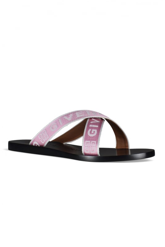 Sandalias de piel rosa de Givenchy.Logotipo en la suela y las correas.Tacones bajos y planos con tiras de tela.Made in Italy.