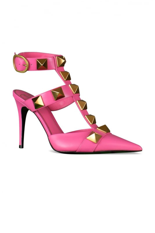Zapatos de salón Valentino Garavani Roman Stud en piel de becerro rosa.Correa con grandes tachuelas.Tachuelas grandes de 18 mm en acabado de latón envejecido.Correa de tobillo ajustable con una gran hebilla.Altura del tacón: 10 cm.100% piel de becerro.Made in Italy.
