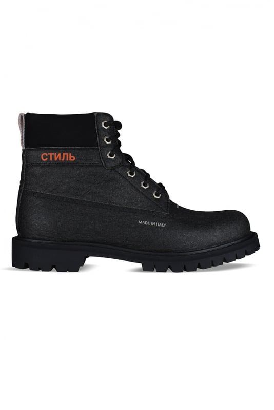 Schwarze Stiefeletten von Heron Preston.Schnürverschluss.СТИЛЬ-Aufdruck in Orange.Gummisohle.80 % Kunstleder, 20 % Polyamid.