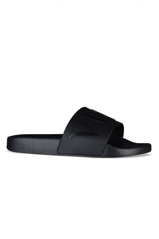 Sandalias Valentino VLTN.Goma negra.Logotipo de la firma  VLTN  en relieve en negro.Suela de goma negra.Made in Italy.