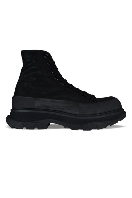 Sneakers altas Alexander McQueen Tread Slick.Malla negra.Puntera redonda con inserción de goma.Logotipo en el talón y la lengüeta.Cierre de cordón plano negro.Suela de goma negra sobredimensionada de la firma.Made in Italy.