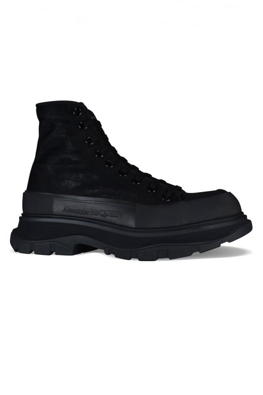 Sneakers altas Alexander McQueen Tread Slick.Malla negra.Puntera redonda con inserción de goma.Logotipo en el talón y la lengüeta.Cierre de cordón plano negro.Suela de goma negra sobredimensionada de la firma.Made in Italy.