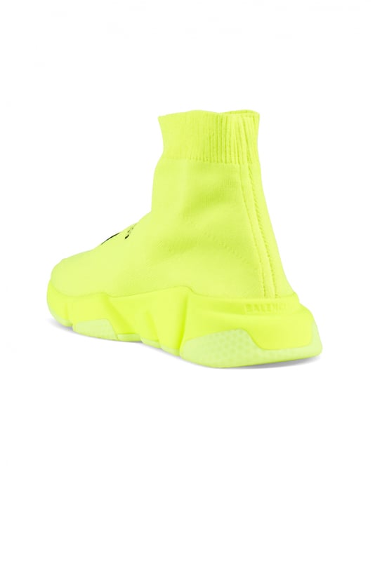 Zapatillas Balenciaga Speed Soccer, amarillas.Malla técnica 3D.Estampado negro en la parte delantera.Logotipo negro impreso en el exterior de la zapatilla.Logotipo en relieve en la parte trasera.Suela amarillo fluorescente.Made in Italy.