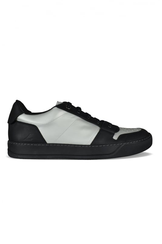 Sneakers Lanvin DBB1 en piel negra y gris metalizado.Logotipo L grabado en el exterior.Suela de goma negra.Cordones negros.Punta redondeada.