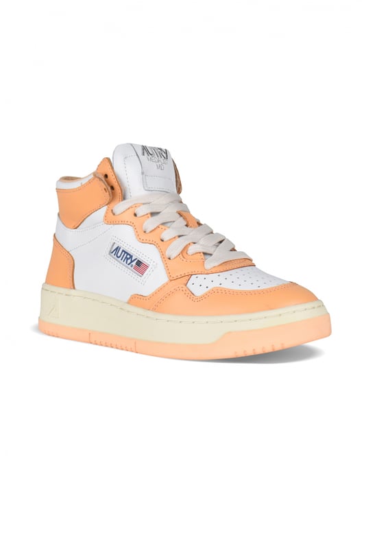 Sneakers altas Autry  Medalist Mid  de piel blanca y naranja.Parche del logotipo en el exterior. Lengüeta con parche del logotipo.Suela de caucho efecto amarilleado con logotipo en relieve.  Cierre con cordones.Puntera redonda perforada.100% cuero.