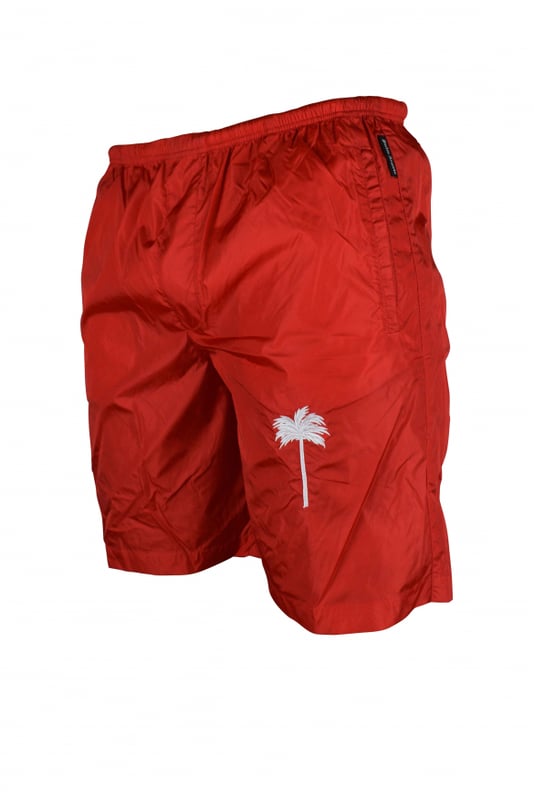 Rode Palm Angels-zwemshort van nylon.Wit geborduurde palmboom op de voorkant.Heeft 3 zakken.KlepzakkenTrekkoord in de taille.Zwart logolabel aan de zijkant.Volledig gevoerd.Gemaakt in Italië.