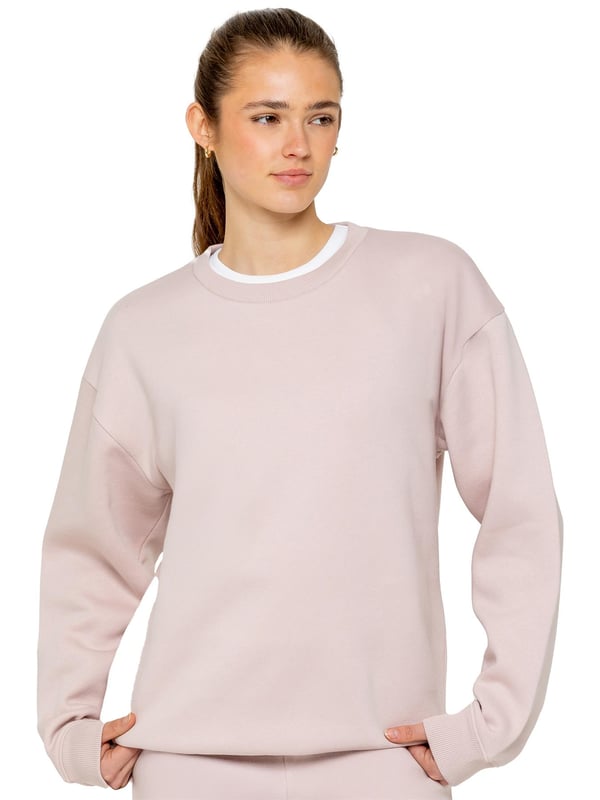 Enzo Women’s Oversized Sweatshirt and Relaxed Fit Joggers. Fashioned in Pure Fabric for Softness and Comfort. Joggers Feature 2 Side Slash Pockets. Brushed Back Inner Fleece Lining. Cuffed Leg Design. Elasticated Waist with drawstrings. Ideal to use for Casual and Work wear.