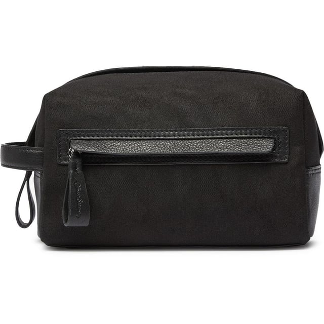Travel in style with the Oliver Sweeney Hartwell washbag. This black leather toiletries bag makes a sharp statement whether on a short break or a weekend away. The water-resistant lining, elasticated internal pockets, zip closure and external zip pocket add to the practicality. This bag complements your make-up and shower essentials.