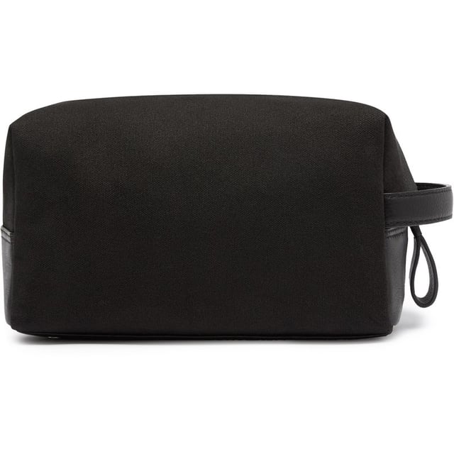 Travel in style with the Oliver Sweeney Hartwell washbag. This black leather toiletries bag makes a sharp statement whether on a short break or a weekend away. The water-resistant lining, elasticated internal pockets, zip closure and external zip pocket add to the practicality. This bag complements your make-up and shower essentials.