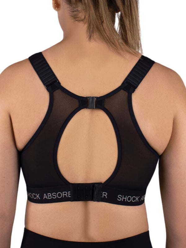 Shock Absorber Ultimate Run Padded Sports Bra. Non-wired sports bra designed for running with moisture-wicking material, wide padded racerback comfort straps, a wide underband and a double back fastening for ultimate support. Product is recommended hand-wash only.