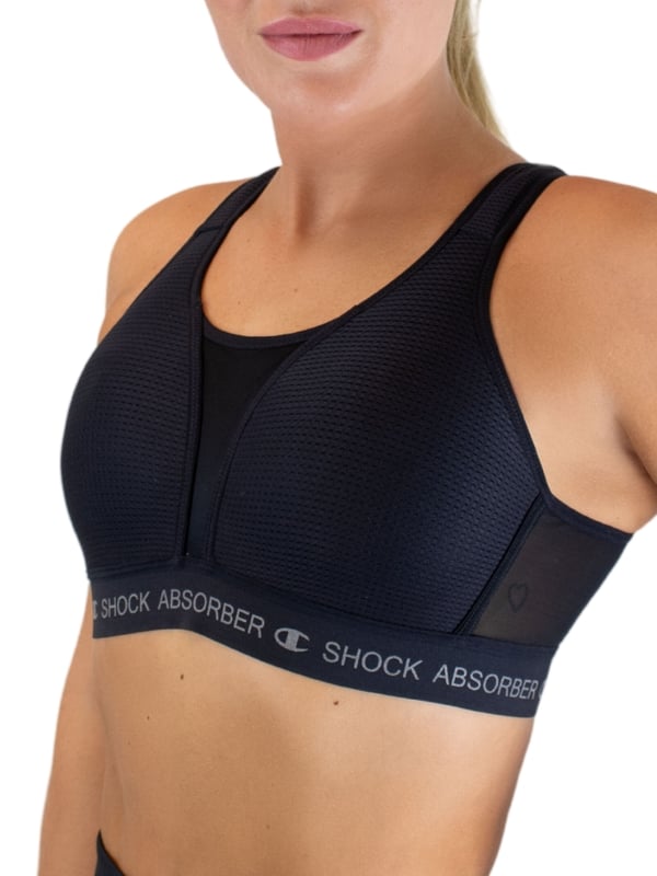 Shock Absorber Ultimate Run Padded Sports Bra. Non-wired sports bra designed for running with moisture-wicking material, wide padded racerback comfort straps, a wide underband and a double back fastening for ultimate support. Product is recommended hand-wash only.