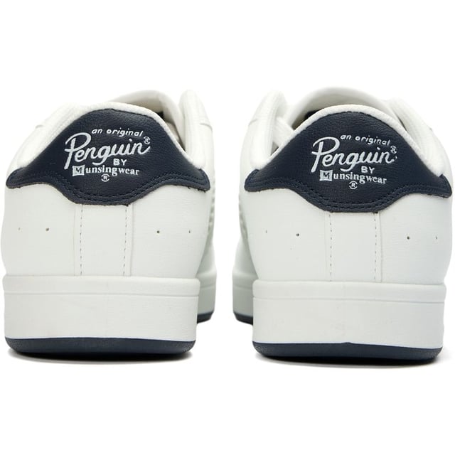 The Penguin Steadman offers a clean, contemporary take on court-inspired casual trainers. Crafted with a durable synthetic white upper that maintains its crisp appearance, these versatile kicks feature subtle penguin branding for understated style. A cushioned insole delivers all-day comfort while the padded collar ensures a snug, supportive fit. The reliable rubber sole provides excellent traction for everyday wear, making these trainers an effortless addition to your casual wardrobe.