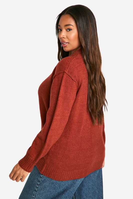 Oversized boyfriend-style cardigan for a relaxed, effortless look
        Distinctive seam detailing adds visual interest
        Chunky knit texture for warmth and comfort
        Large, statement buttons for easy fastening
        Versatile design suitable for various casual occasions
    
    Embrace laid-back chic with this plus-size oversized boyfriend cardigan from Boohoo. The soft, chunky knit fabric ensures comfort while the relaxed silhouette offers a trendy, effortless vibe. Perfect for those casual days when you want to look stylish without trying too hard. Layer it over a simple white tee and pair with wide-leg jeans for a contemporary look that's both comfortable and fashion-forward. The distinctive seam detailing and statement buttons add subtle interest to this versatile piece. Ideal for family gatherings, weekend brunches, or casual outings with friends. Style it with trainers for a relaxed daytime look or dress it up with ankle boots for an evening out. This cardigan is a must-have addition to your autumn and winter wardrobe, offering endless styling possibilities for the fashion-savvy Boohoo girl.