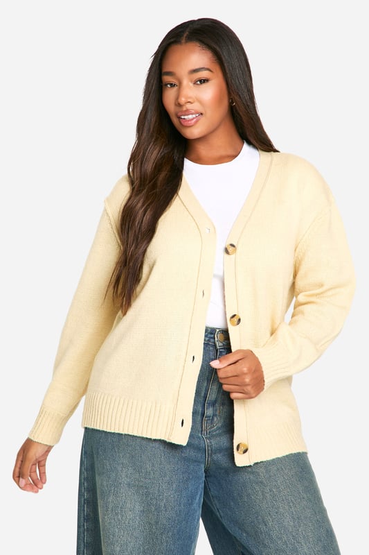 Oversized boyfriend-style cardigan for a relaxed, effortless look
        Soft knitted fabric for ultimate comfort
        Distinctive seam detailing adds visual interest
        Button-front closure with stylish contrasting buttons
        Versatile design suitable for various casual occasions
    
    Embrace laid-back chic with this plus-size oversized boyfriend cardigan from Boohoo. The soft knitted fabric ensures all-day comfort, while the relaxed fit allows for easy layering over your favourite outfits. The distinctive seam detailing adds a subtle touch of interest to this wardrobe staple. Perfect for casual outings, family gatherings, or lazy weekends at home, this cardigan can be styled in numerous ways. Pair it with wide-leg jeans and trainers for a trendy daytime look, or throw it over a simple dress for a cosy evening ensemble. The versatile design makes it an ideal choice for transitional weather, offering both warmth and style. Whether you're running errands or meeting friends for coffee, this cardigan will keep you looking effortlessly fashionable while feeling comfortably snug.