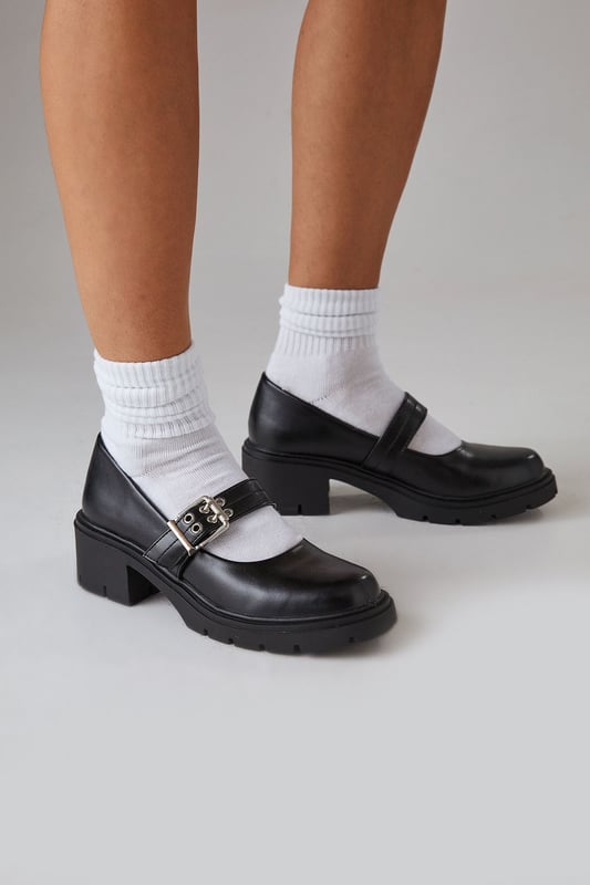 Chunky heel design for added comfort and stability
        Decorative buckle detail adds a touch of elegance
        Mary Jane style with adjustable strap for a secure fit
        Mid-heel height between 5 and 6.5cm for versatile wear
        Durable synthetic outsole for long-lasting wear
    
    Step out in style with these charming Mary Jane chunky heel shoes. The Hadley design from Faith combines classic charm with modern edge, perfect for the fashion-forward woman who values both style and comfort. The faux leather upper gives a polished look, while the chunky heel and platform sole offer stability and height without sacrificing comfort. Style these versatile shoes with a pleated mini skirt and a crisp white tee for a preppy daytime look, or pair them with your favourite jeans and a blouse for casual outings. The adjustable strap ensures a snug fit, making these shoes ideal for long days out shopping or casual gatherings with friends. Whether you're heading to a family lunch or a day in the office, these shoes will keep you looking chic and feeling comfortable from morning to night.