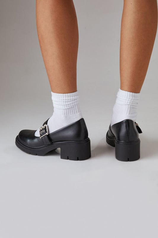 Chunky heel design for added comfort and stability
        Decorative buckle detail adds a touch of elegance
        Mary Jane style with adjustable strap for a secure fit
        Mid-heel height between 5 and 6.5cm for versatile wear
        Durable synthetic outsole for long-lasting wear
    
    Step out in style with these charming Mary Jane chunky heel shoes. The Hadley design from Faith combines classic charm with modern edge, perfect for the fashion-forward woman who values both style and comfort. The faux leather upper gives a polished look, while the chunky heel and platform sole offer stability and height without sacrificing comfort. Style these versatile shoes with a pleated mini skirt and a crisp white tee for a preppy daytime look, or pair them with your favourite jeans and a blouse for casual outings. The adjustable strap ensures a snug fit, making these shoes ideal for long days out shopping or casual gatherings with friends. Whether you're heading to a family lunch or a day in the office, these shoes will keep you looking chic and feeling comfortable from morning to night.