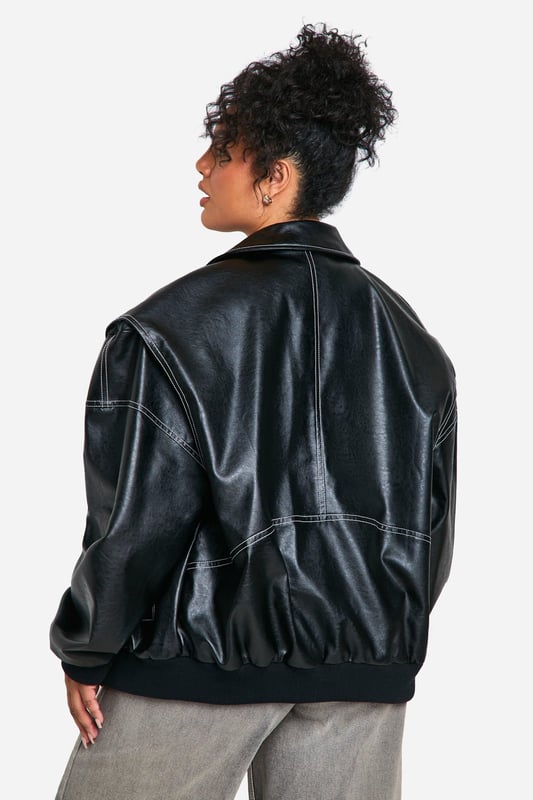 Oversized bomber jacket with striking contrast stitching
        Sleek PU material for a leather-like appearance
        Relaxed fit with dropped shoulders for comfort
        Ribbed collar, cuffs, and hem for a classic bomber silhouette
        Versatile design suitable for various casual occasions
    
    Make a bold statement with this oversized PU bomber jacket, perfect for the fashion-forward woman who loves to stand out. The contrast stitching adds a unique touch to the classic bomber silhouette, while the relaxed fit ensures comfort without compromising on style. Pair it with wide-leg trousers and trainers for a trendy daytime look, or throw it over a simple dress for an edgy evening ensemble. This versatile piece is ideal for casual outings, from coffee dates to shopping trips with friends. The jacket's adaptable nature makes it a go-to choice for family gatherings or laid-back social events. Its timeless design ensures it will remain a wardrobe staple for seasons to come, allowing you to create countless stylish combinations with ease.