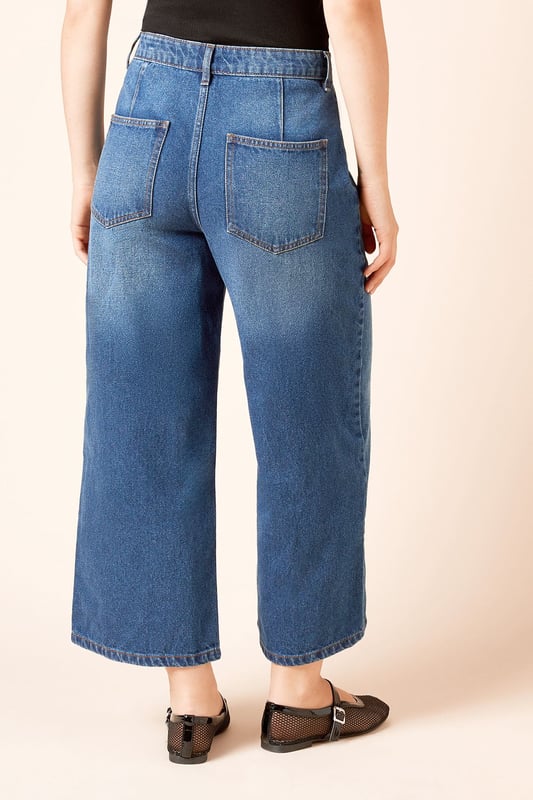 Trendy culotte-style jeans for a modern silhouette
        High-waisted design for a flattering fit
        Wide-leg cut for comfort and style
        Classic five-pocket styling
        Cropped length perfect for showcasing footwear
    
    Embrace effortless chic with these denim culotte jeans from Dorothy Perkins. The high-waisted design and wide-leg cut create a fashionable silhouette that's both comfortable and on-trend. Perfect for the woman who loves to stay current without compromising on comfort, these jeans are ideal for a variety of casual occasions. Style them with a tucked-in blouse and blazer for a smart-casual brunch with friends, or pair with a cosy jumper for a relaxed family gathering. The cropped length is perfect for showing off your favourite flats or trainers, making these jeans a versatile addition to your wardrobe. Easy to dress up or down, they're sure to become a go-to piece for your everyday style, offering that perfect balance of fashion-forward design and practical comfort that Dorothy Perkins is known for.