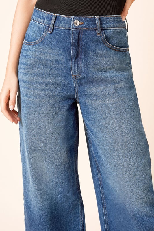 Trendy culotte-style jeans for a modern silhouette
        High-waisted design for a flattering fit
        Wide-leg cut for comfort and style
        Classic five-pocket styling
        Cropped length perfect for showcasing footwear
    
    Embrace effortless chic with these denim culotte jeans from Dorothy Perkins. The high-waisted design and wide-leg cut create a fashionable silhouette that's both comfortable and on-trend. Perfect for the woman who loves to stay current without compromising on comfort, these jeans are ideal for a variety of casual occasions. Style them with a tucked-in blouse and blazer for a smart-casual brunch with friends, or pair with a cosy jumper for a relaxed family gathering. The cropped length is perfect for showing off your favourite flats or trainers, making these jeans a versatile addition to your wardrobe. Easy to dress up or down, they're sure to become a go-to piece for your everyday style, offering that perfect balance of fashion-forward design and practical comfort that Dorothy Perkins is known for.